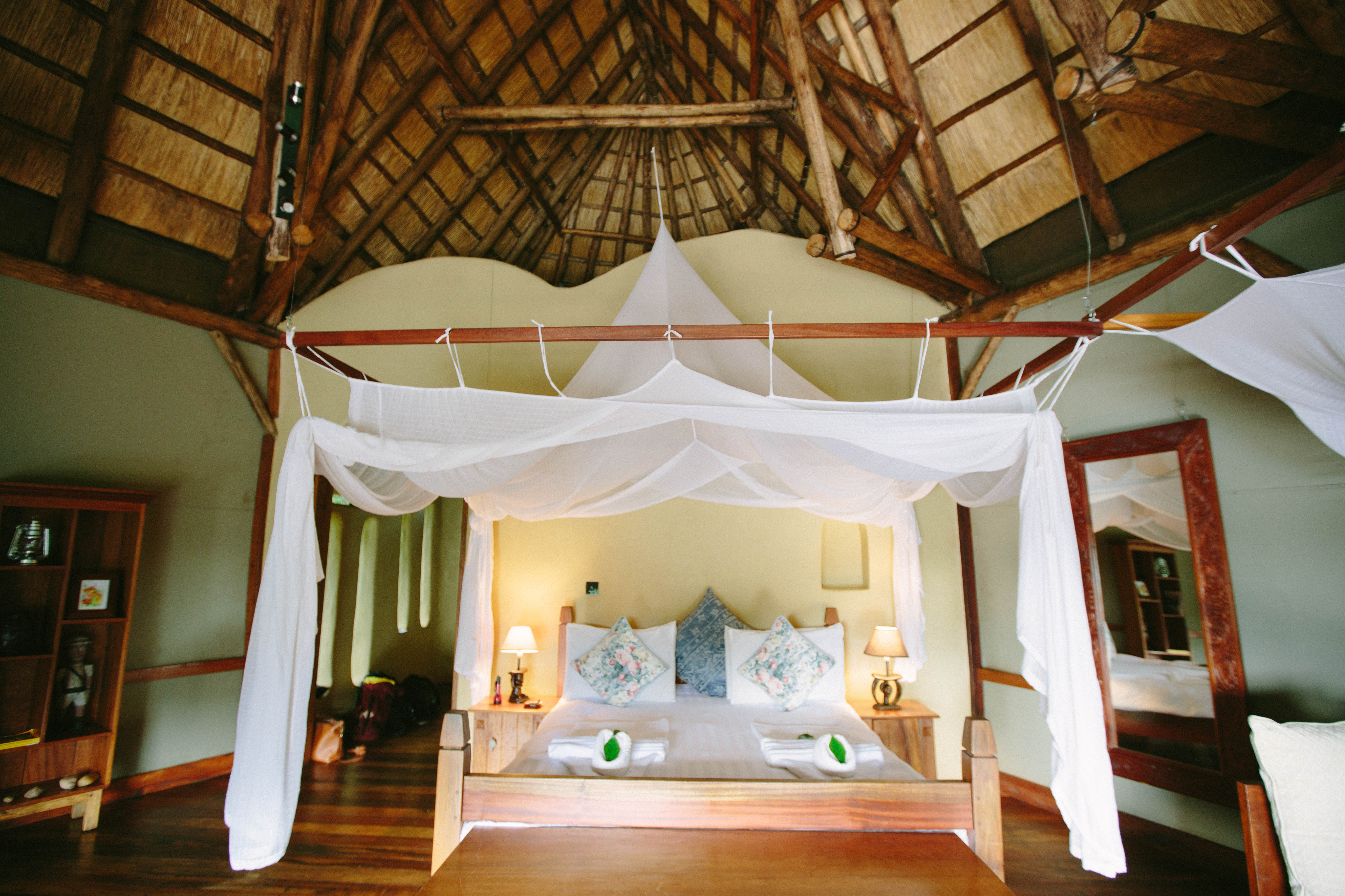 Large ensuite bedrooms with a combination of double and twin beds and an additional day bed.  A writing desk, small lounge and private deck to enjoy the views