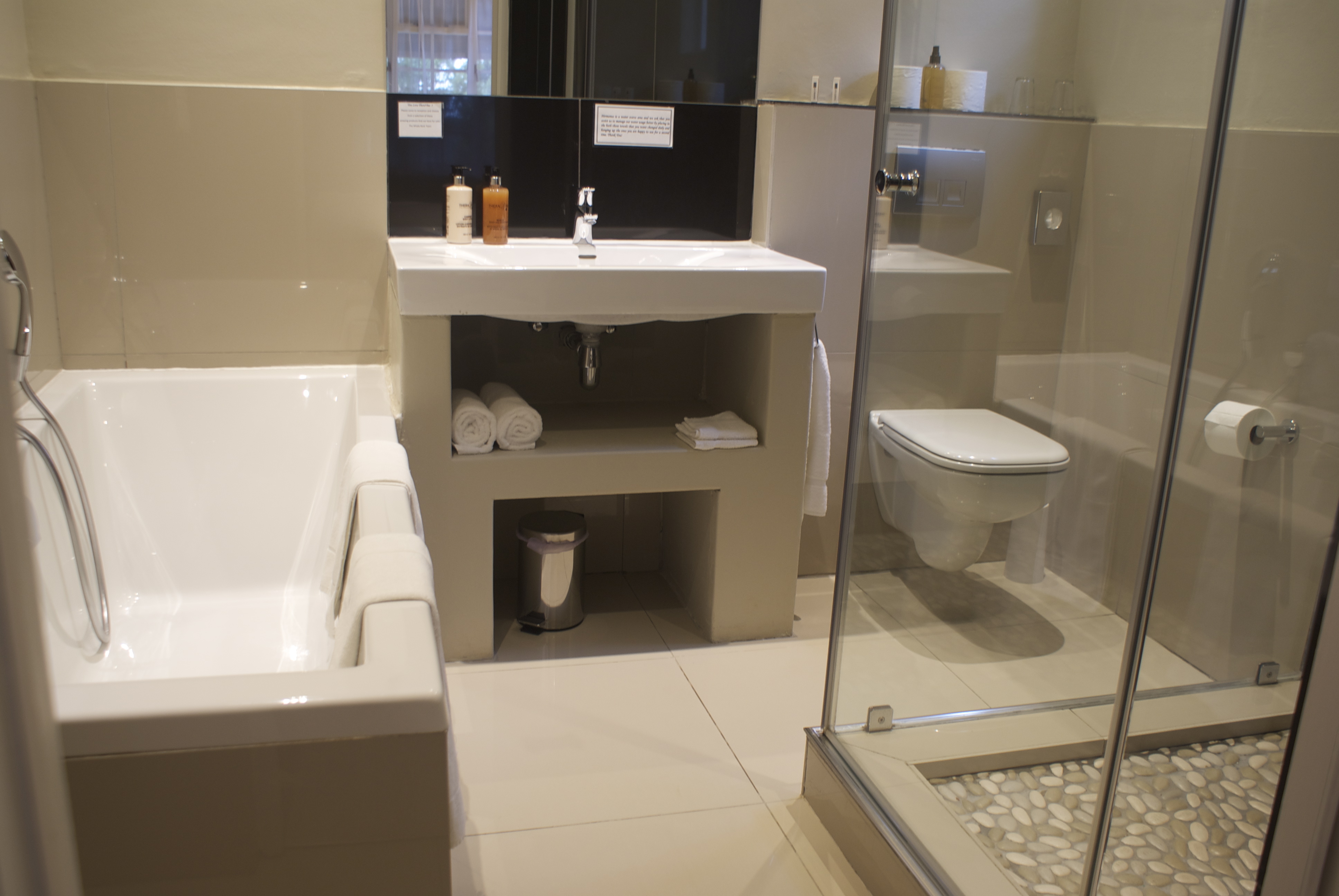 Deluxe Room no.11, bathroom ensuite with bath and separate shower
