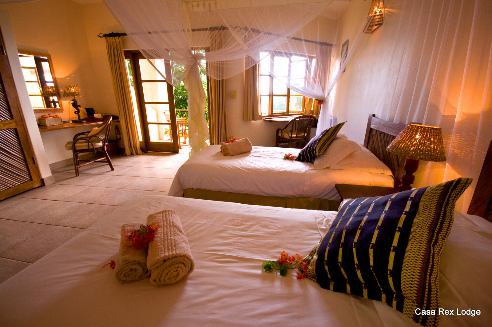 The downstairs Acacia bedrooms are all twins and facing the pool