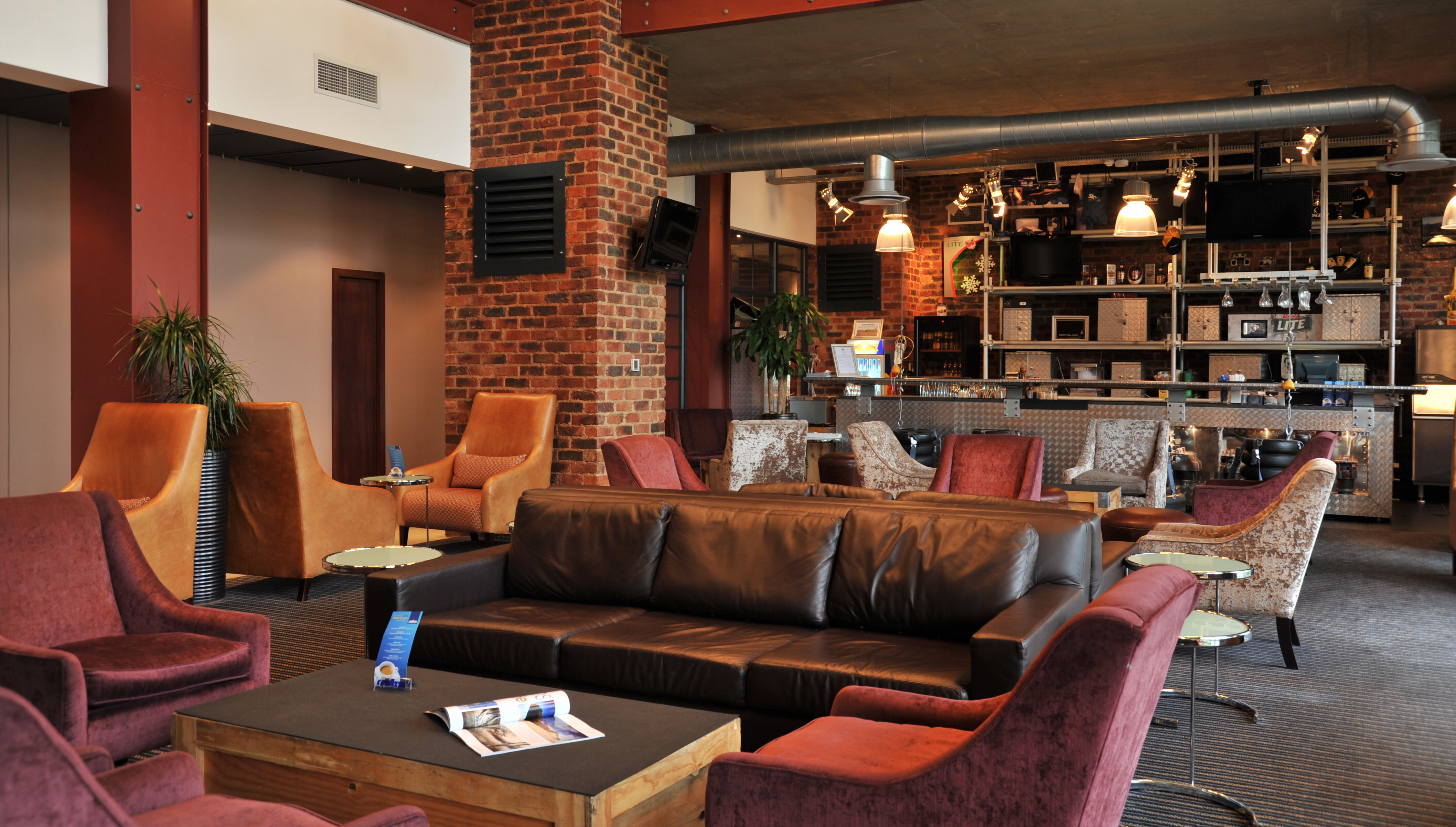 At the long, steel aircraft wing that is the bar, sink into a comfortable couch and relax as you watch the aeroplanes cruise to the landing strip.   The lounge provides a peaceful setting with Wi-Fi access where business travellers can conduct informal meetings.