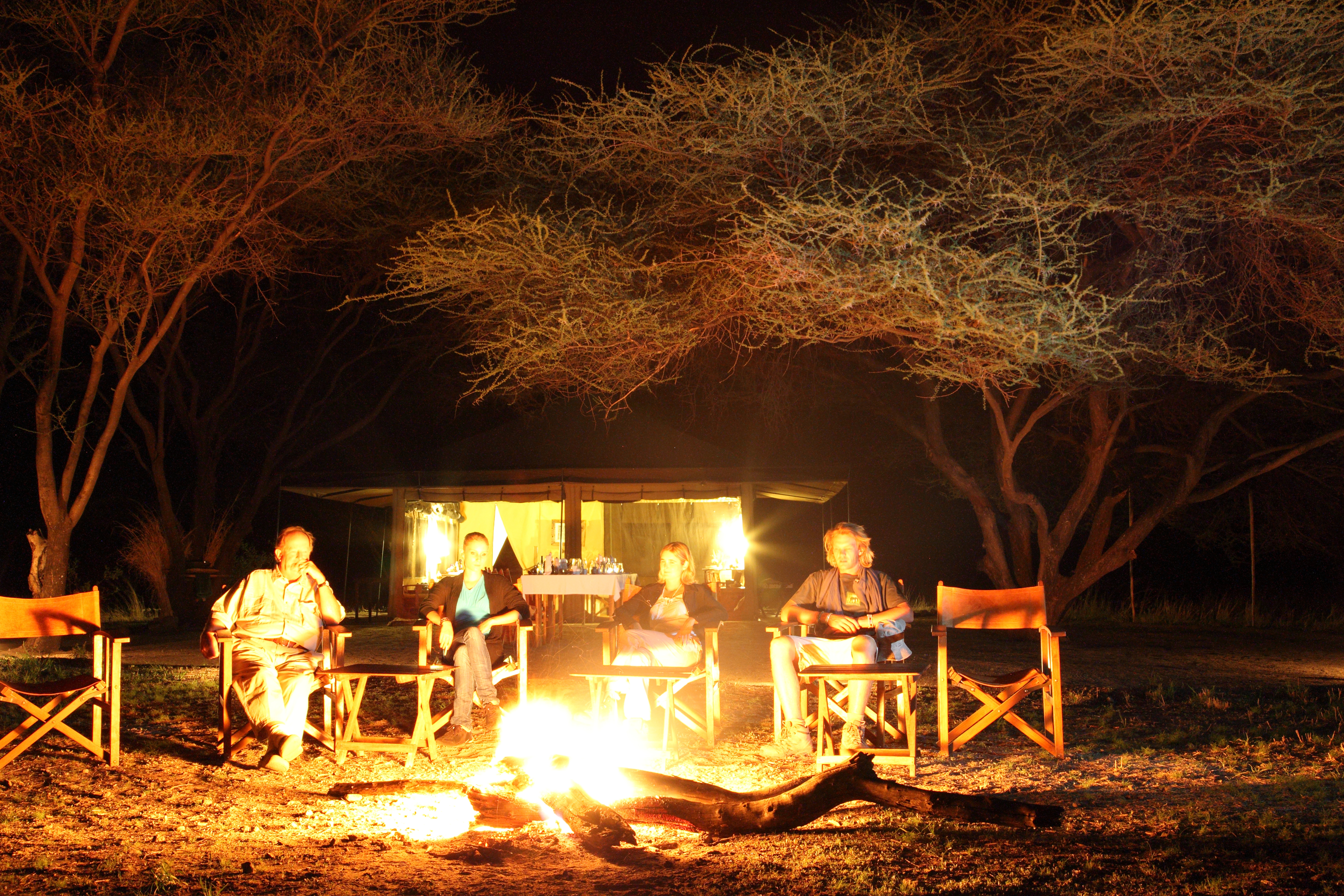Drinks and Canapé's are served by the camp fire