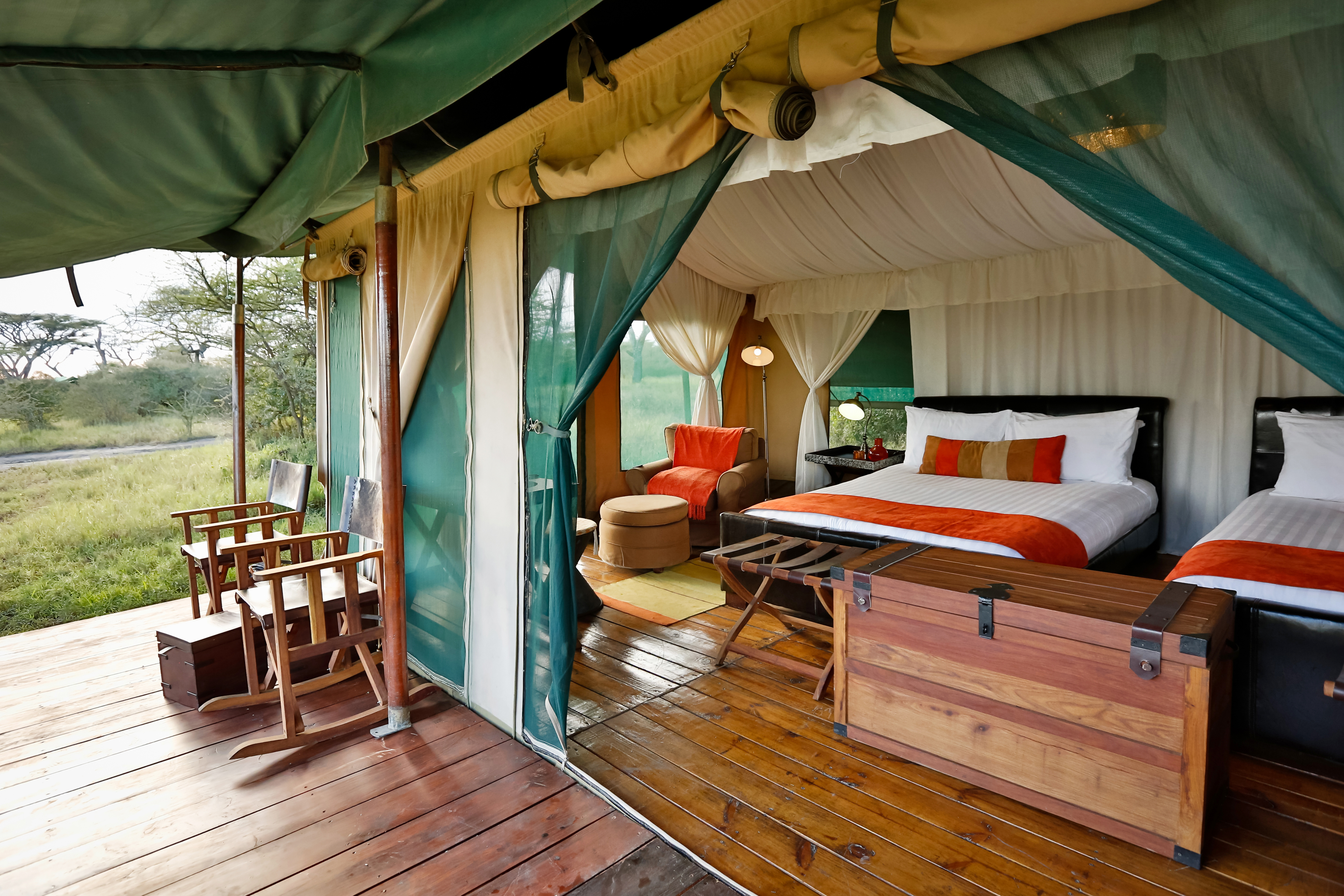 The tents all enjoy queen size twin beds.  All are ensuite with flushing toilets and hot showers.  Power is provided by an inverter and available 24 hrs a day.  Very spacious with lots of room to relax and unwind