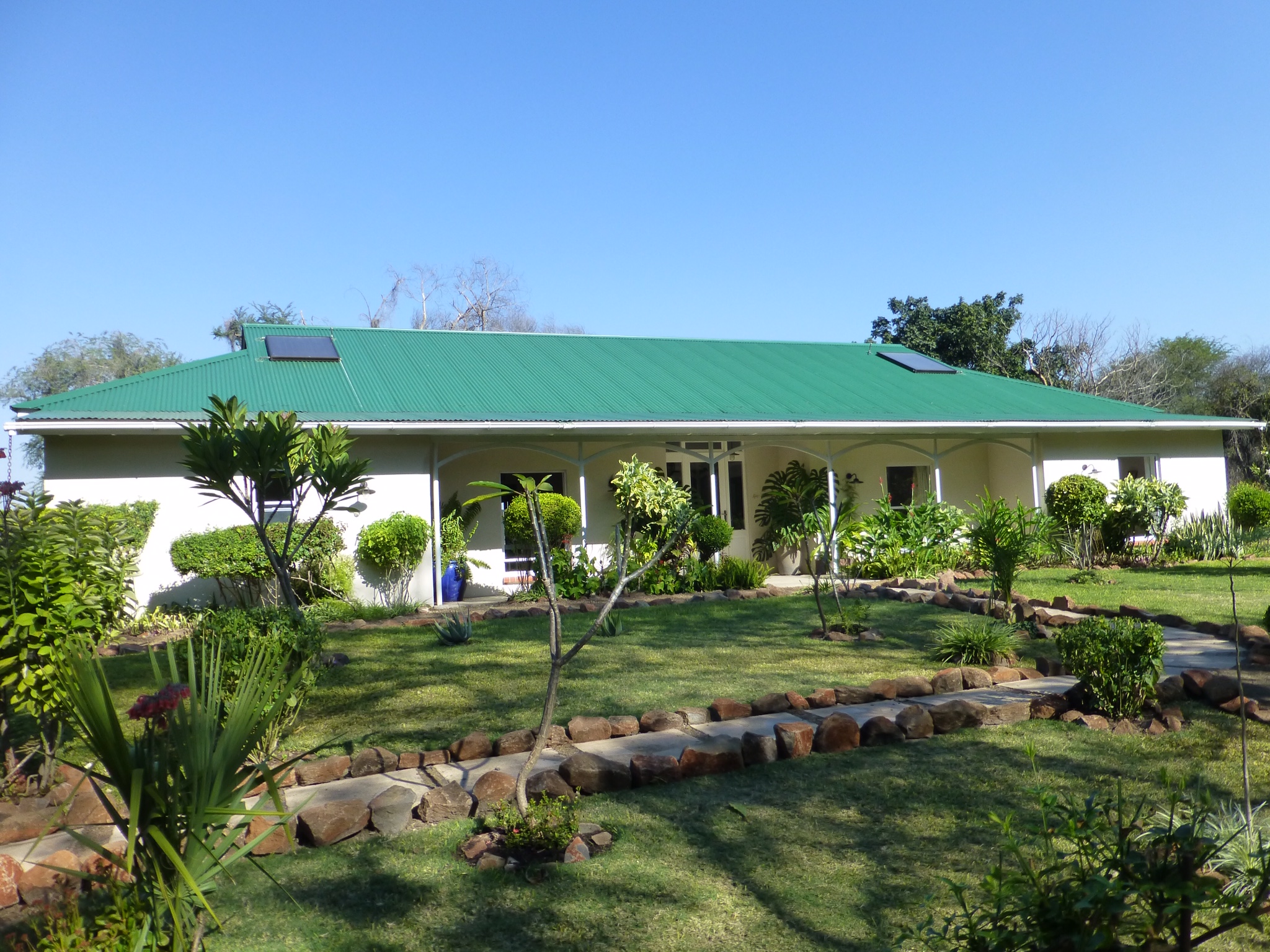 Well maintained gardens to welcome you as you arrive via vehicle