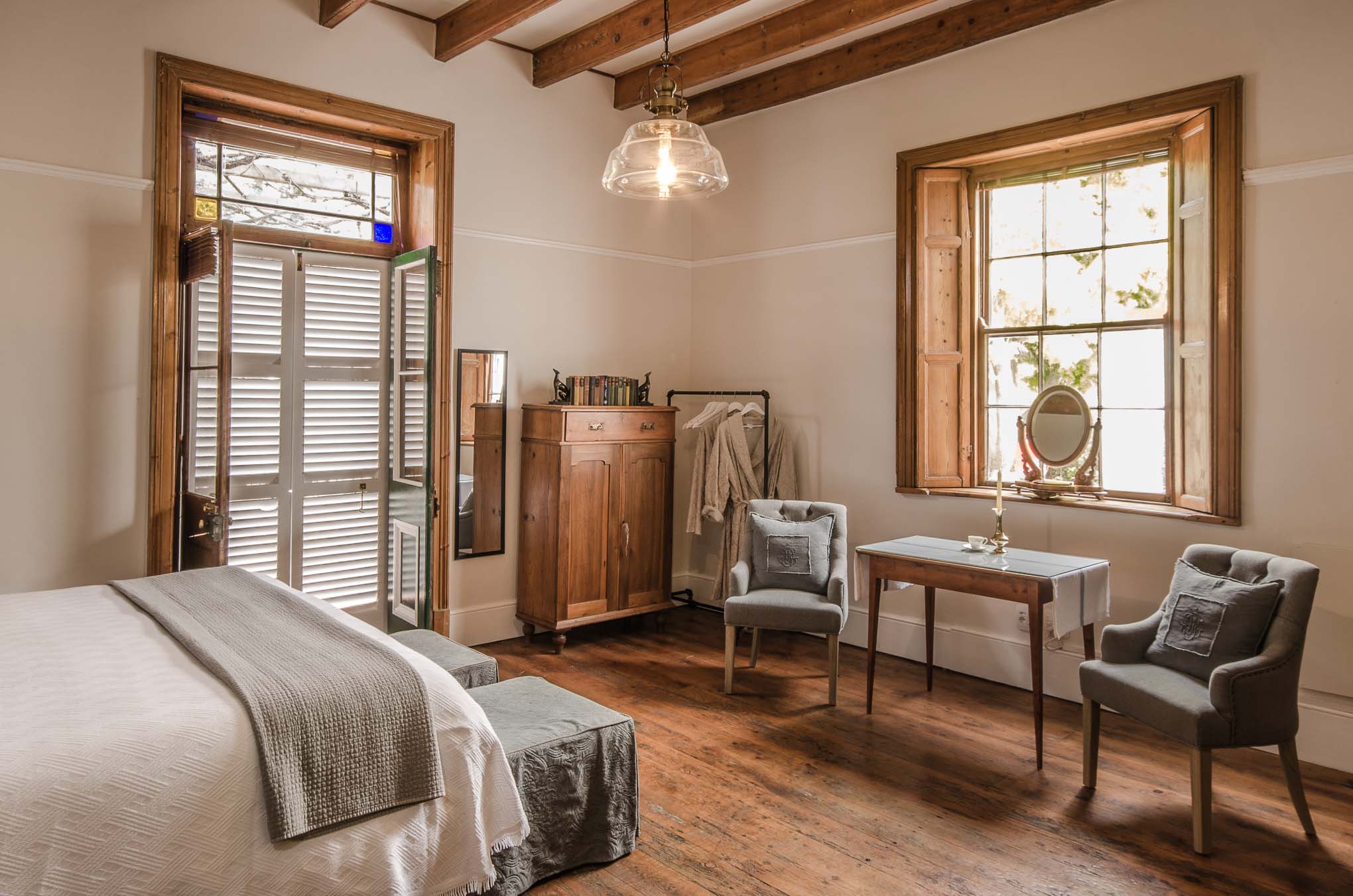 two superior rooms downstairs with high ceilings,fireplaces and wooden floors