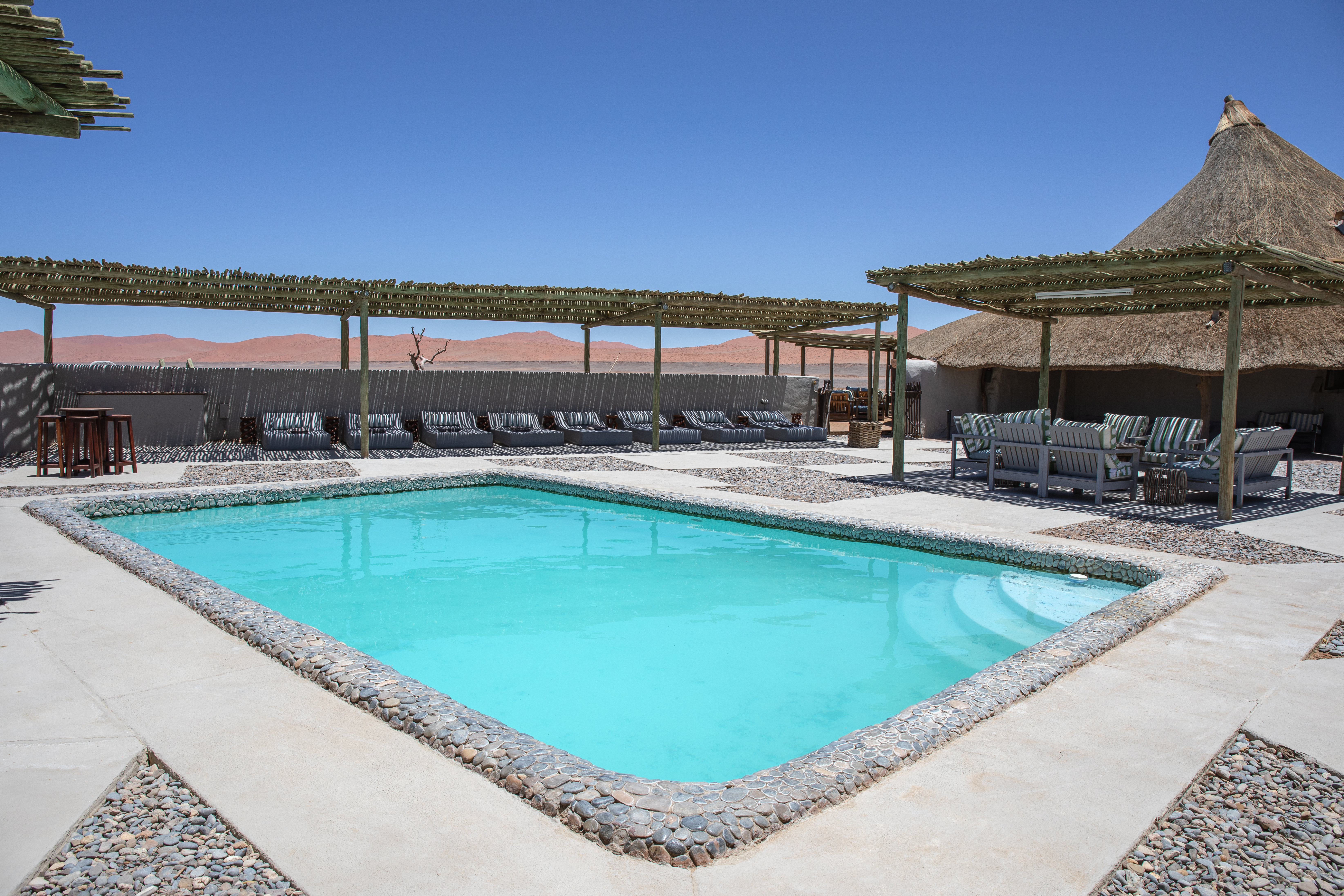 The pool area at Kulala Desert Lodge