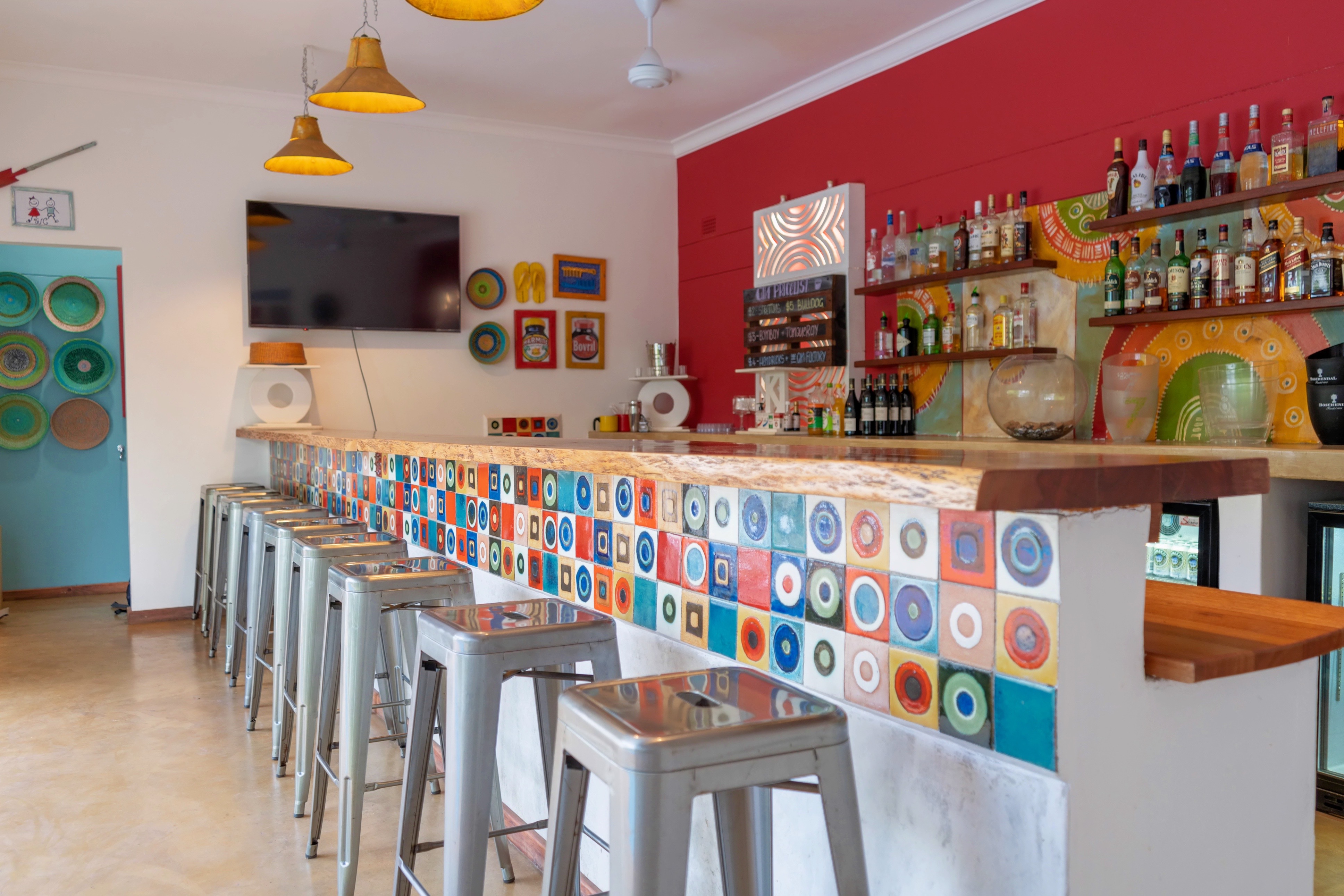 The vibrant and colourful bar is great for having a drink and a chat with our staff, other guests or friends. 
