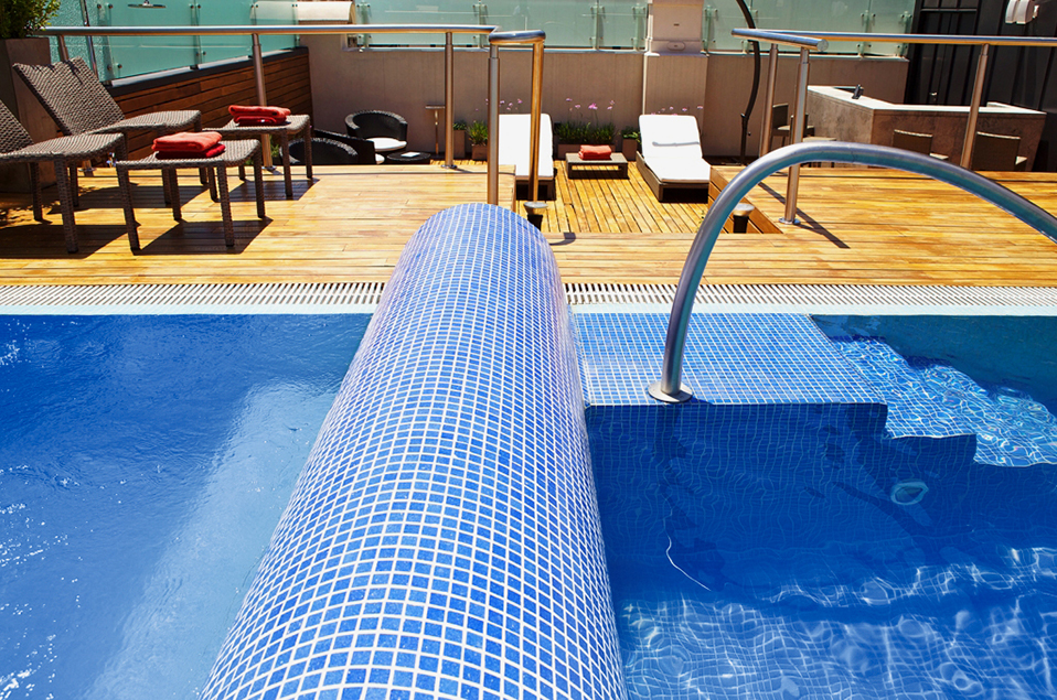 Our oasis in the sky, reminiscent of a Hollywood penthouse veranda, features teak decks and loungers that surround an alluring swimmer’s pool. The rooftop’s open-air lounge invites afternoon tanning in the summer sun or twilight soirées on a warm moonlit Recoleta evening. Hidden away on the rooftop of our Buenos Aires mansion, our sky bar offers an enticing menu of drinks from around the world. Spa services await on the connecting terrace and offer wellness treatments and healing therapies for your body, mind, and soul.